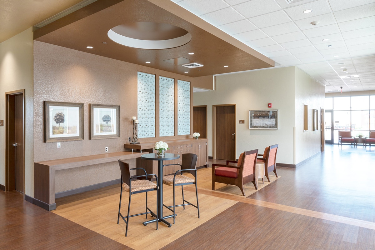 Waiting area with chairs and tables